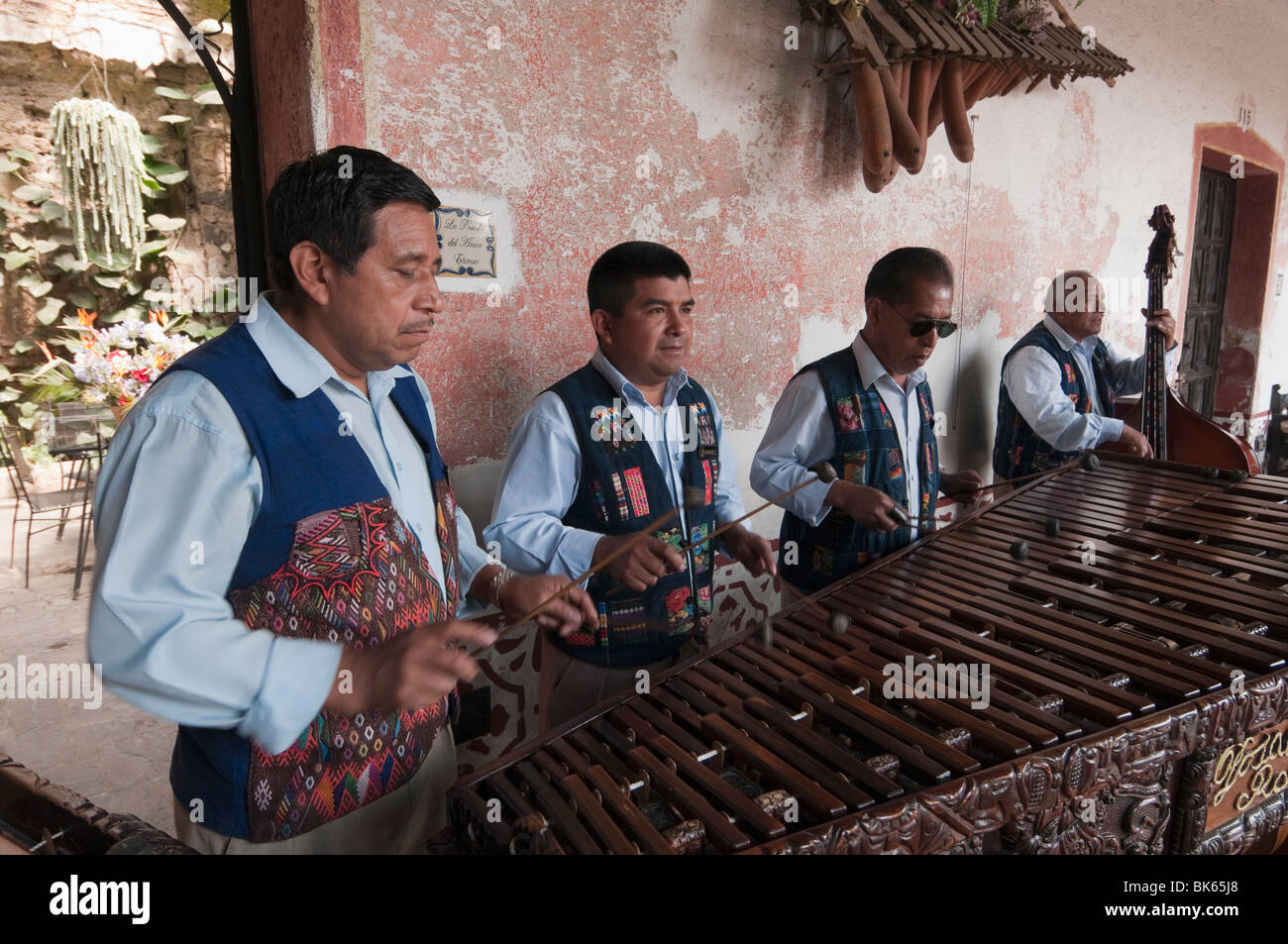 Men playing Marimba at Hotel Posada Don Rodrigo, Antigua, Guatemala, Central America Stock Photo