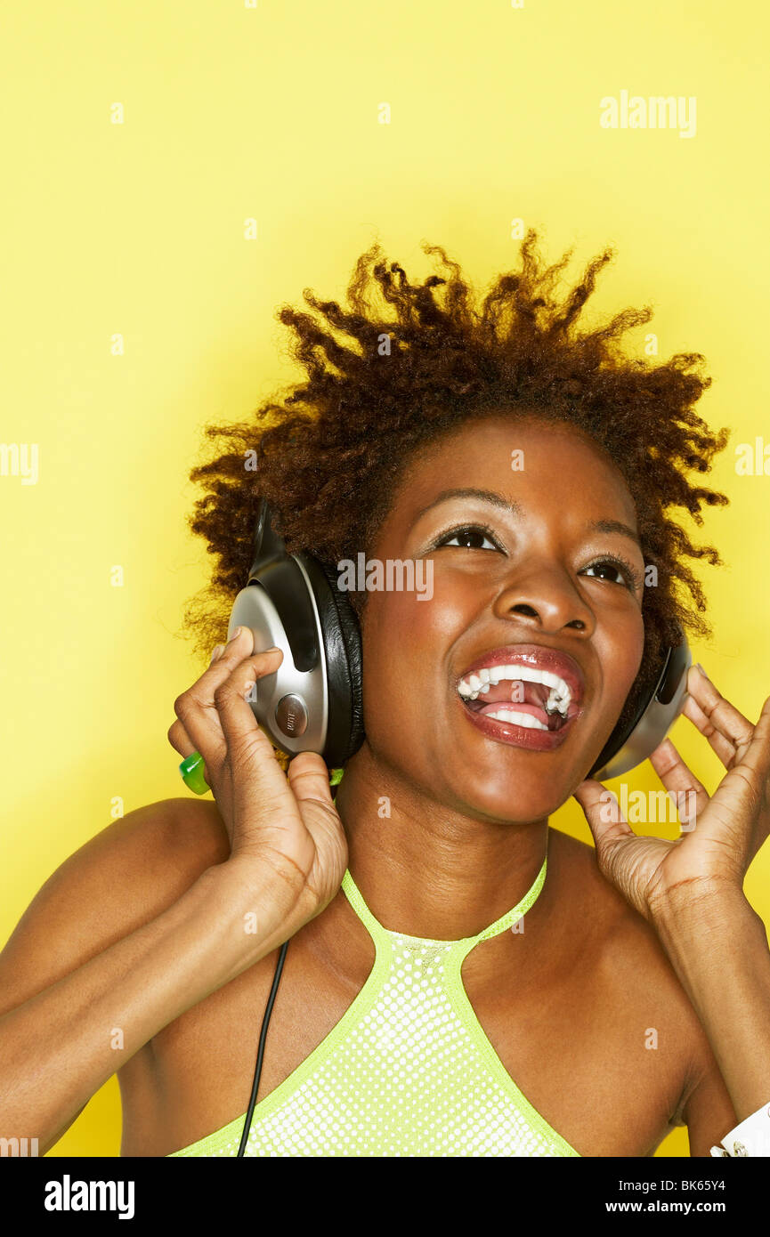 Laughing adult african woman wearing hi-res stock photography and ...