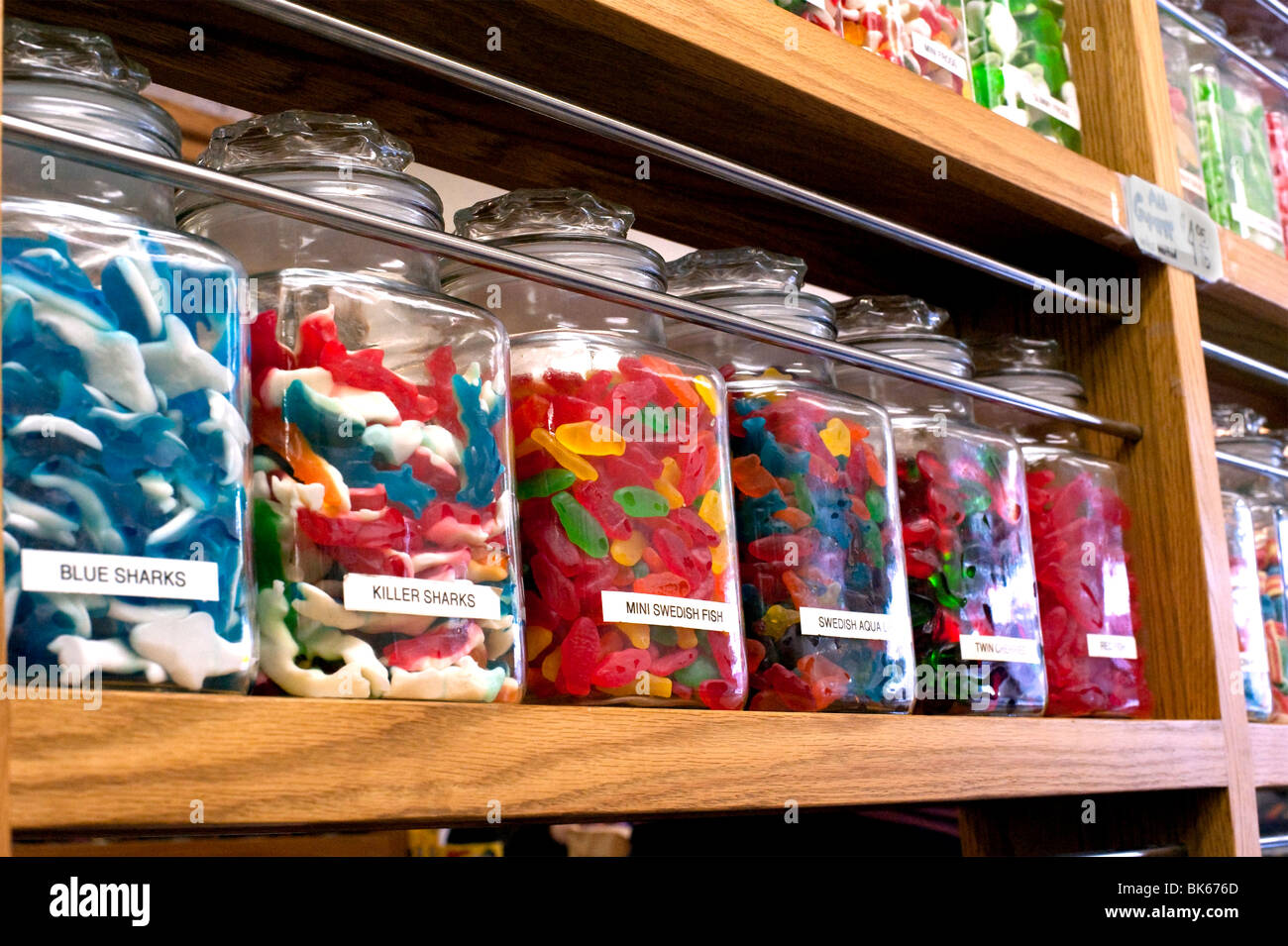 Candy jars on the shelves in a candy store Stock Photo Alamy