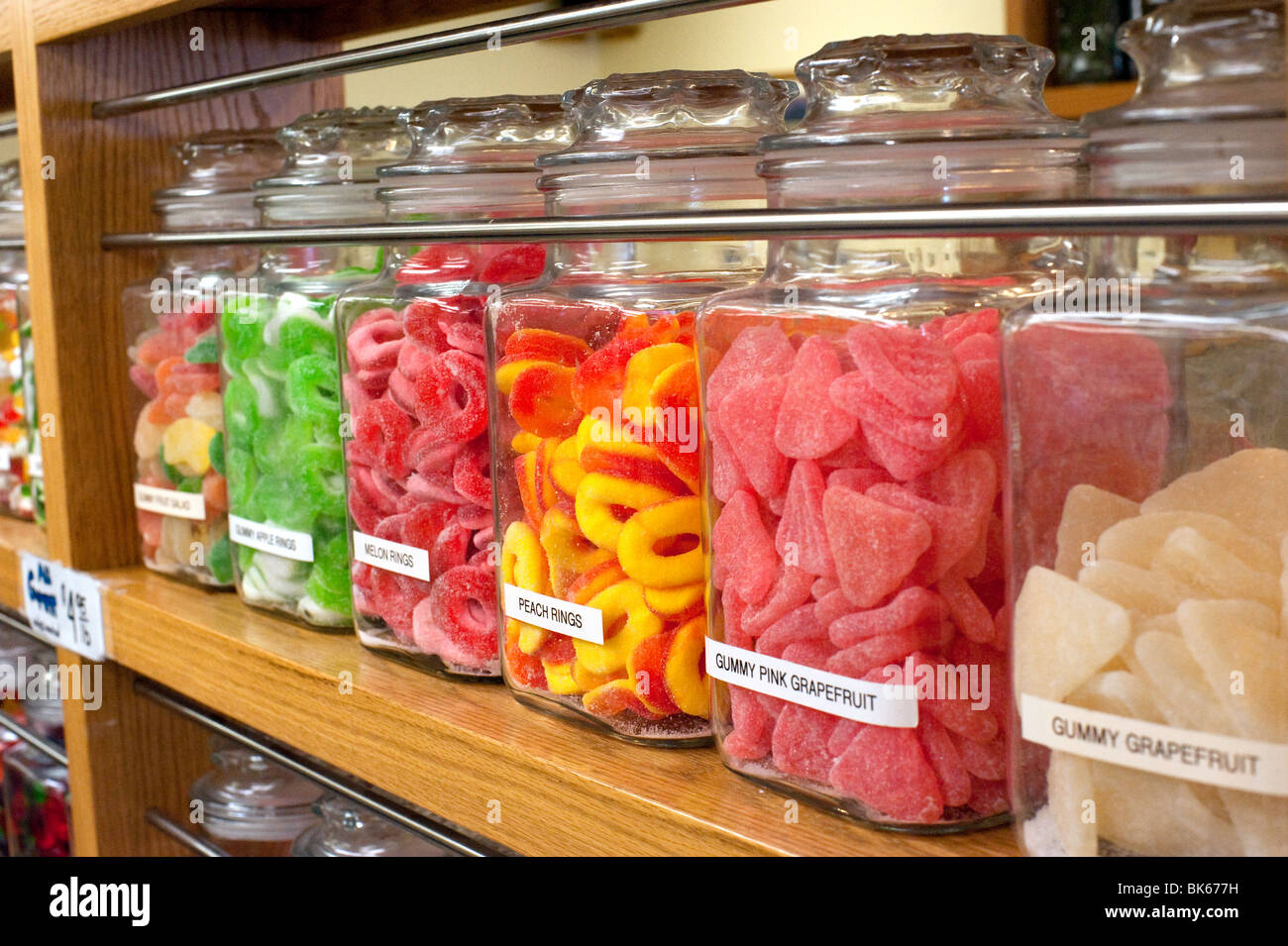 Candy jars on the shelves in a candy store Stock Photo Alamy
