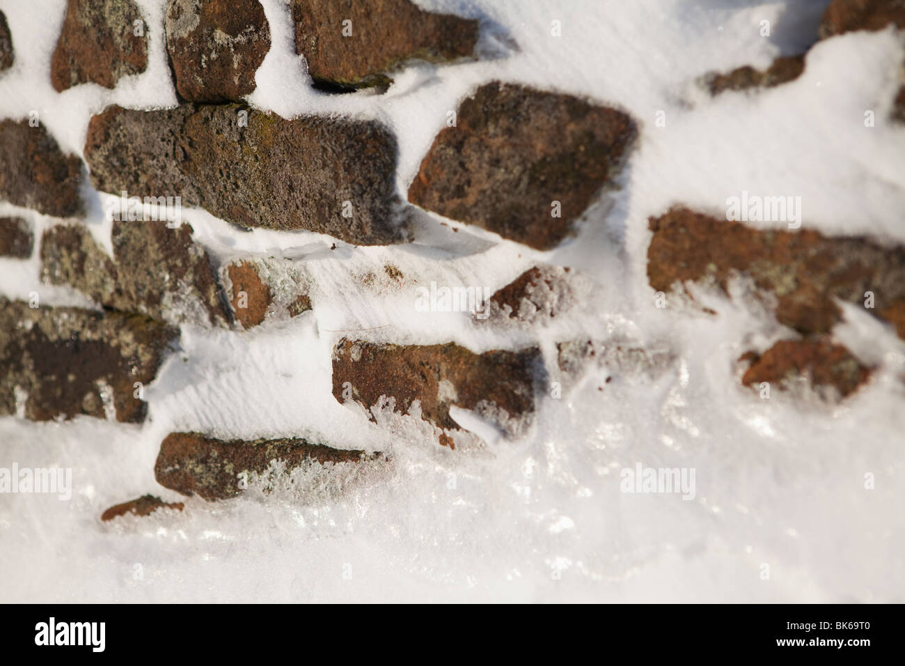 Snow Blown against a Dry stone Wall, The Peak District National Park, UK, England Stock Photo