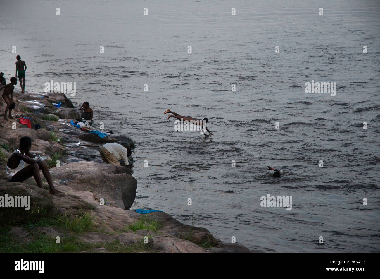 young people washing and swimming in Congo river Stock Photo