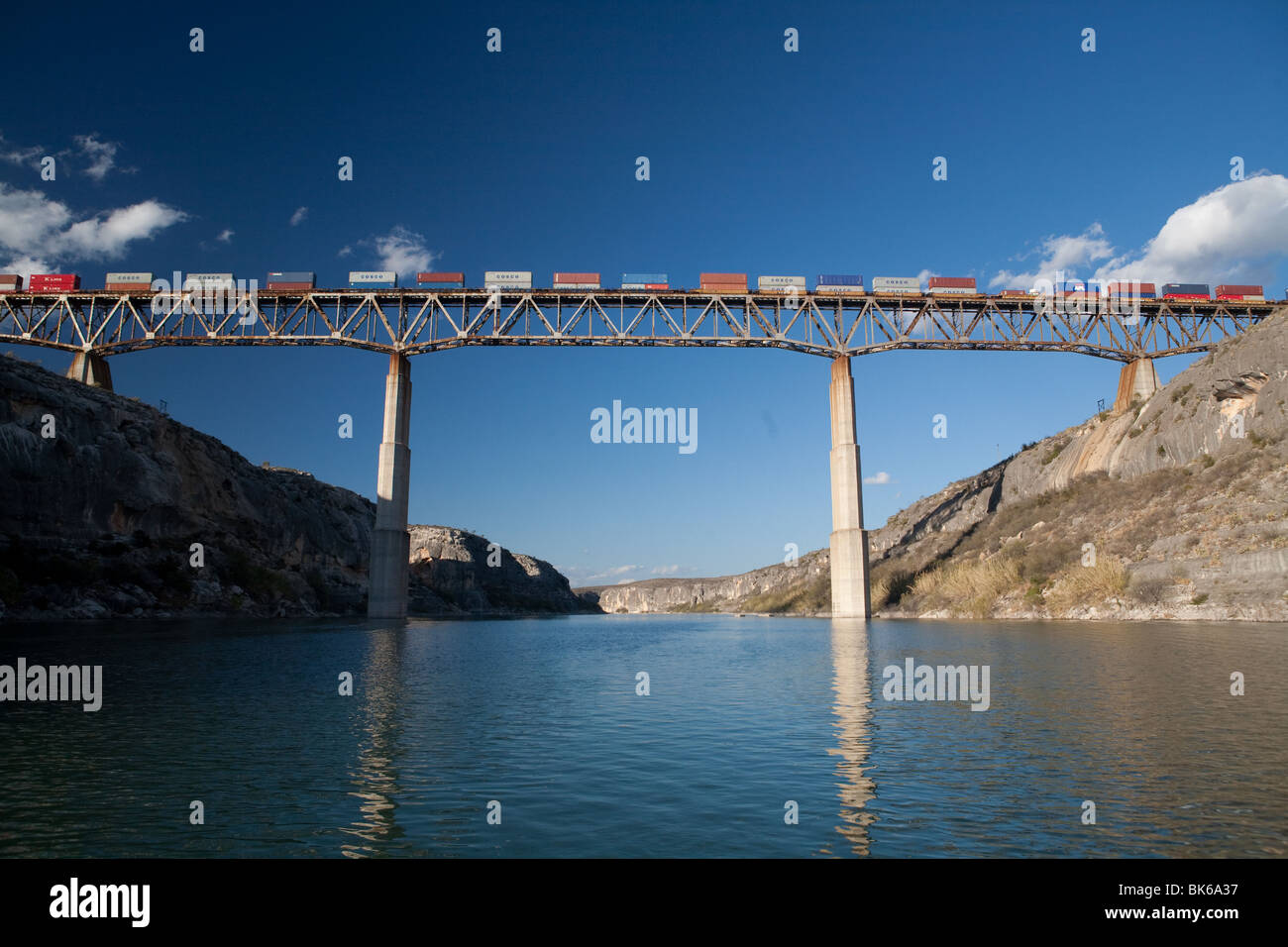 Freight train on bridge above the Pecos River arm of Lake Amistad in