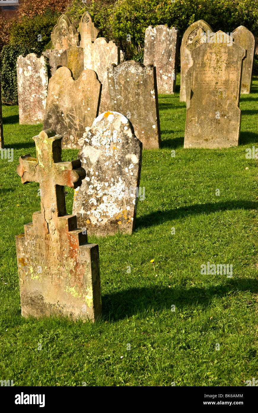 Headstones in a church graveyard Stock Photo - Alamy