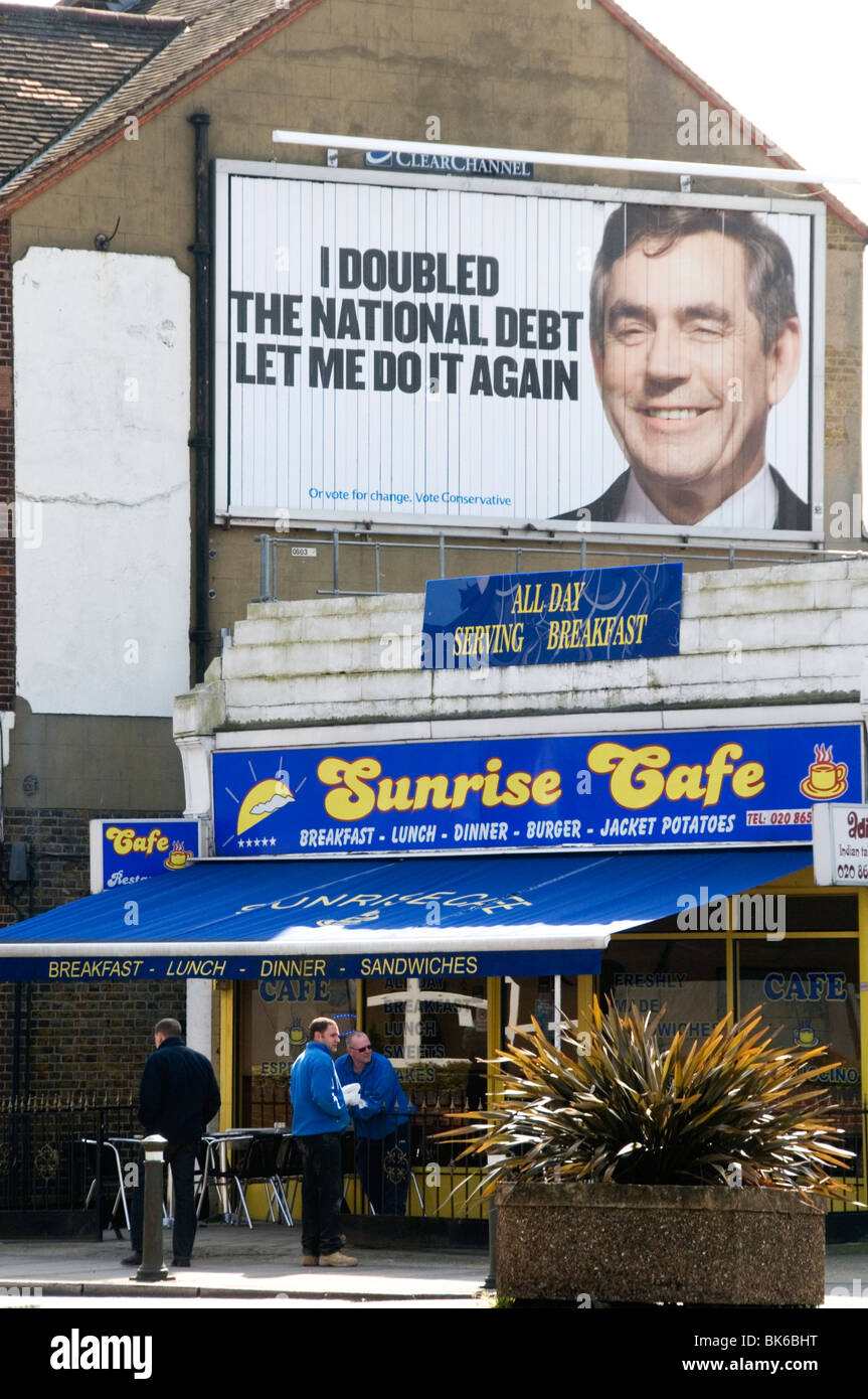 Conservative election poster above the Sunrise Cafe in Elmer's End, South London Stock Photo Alamy