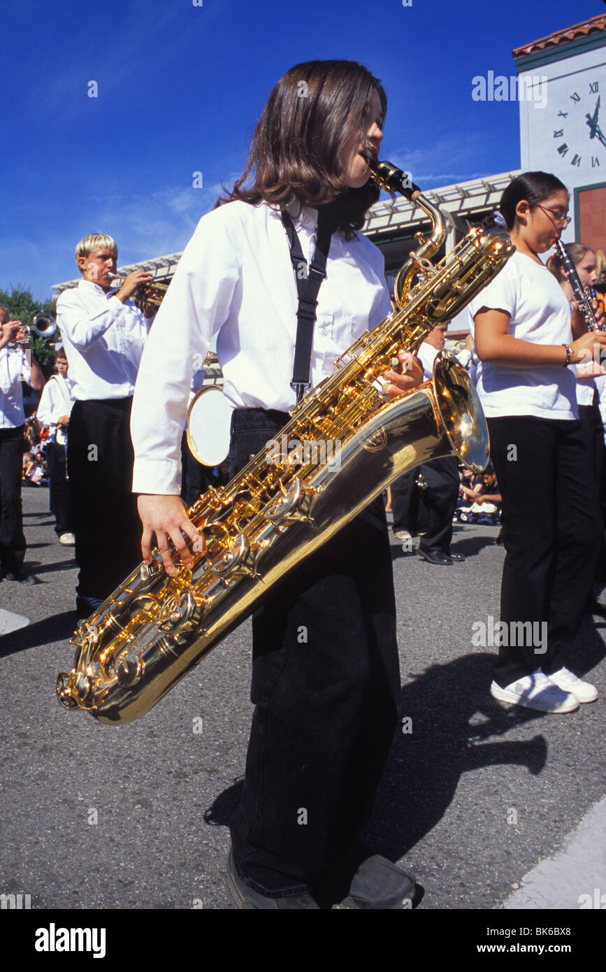 mixed gender high school students marching band saxophone Stock Photo