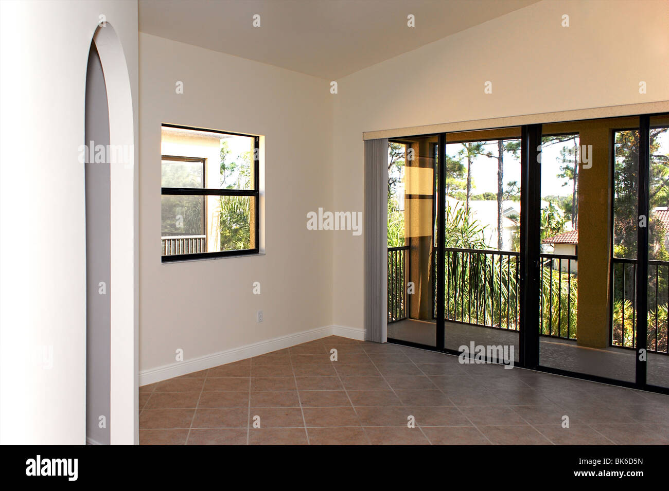 great room in florida condo showing great room with sliding glass doors
