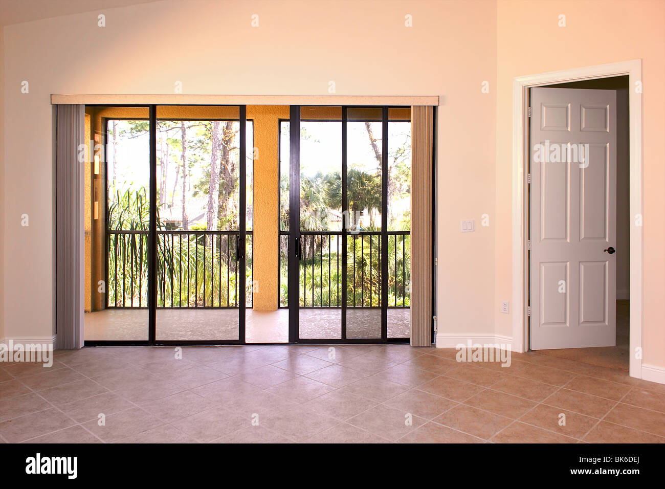 great room in florida condo showing great room with sliding glass doors