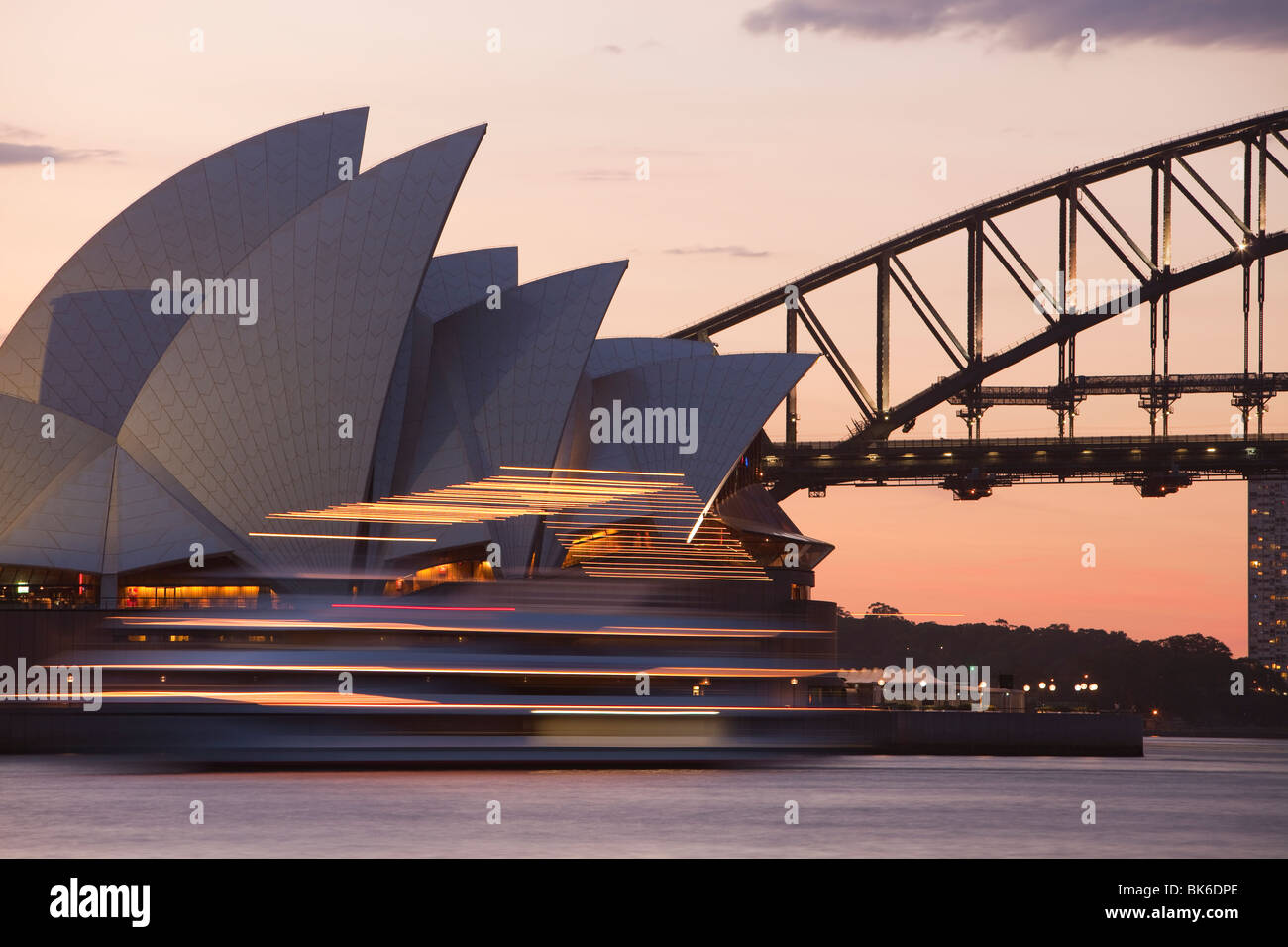 Sydney Opera House and Harbour Bridge at sunset, Australia Stock Photo ...