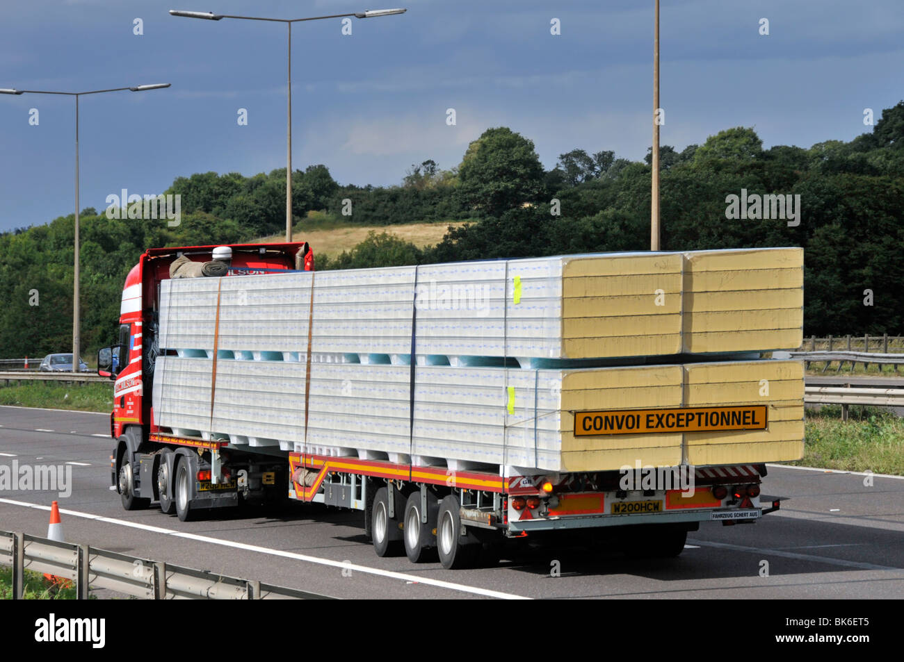 Loaded trailer and lorry on M25 motorway Stock Photo