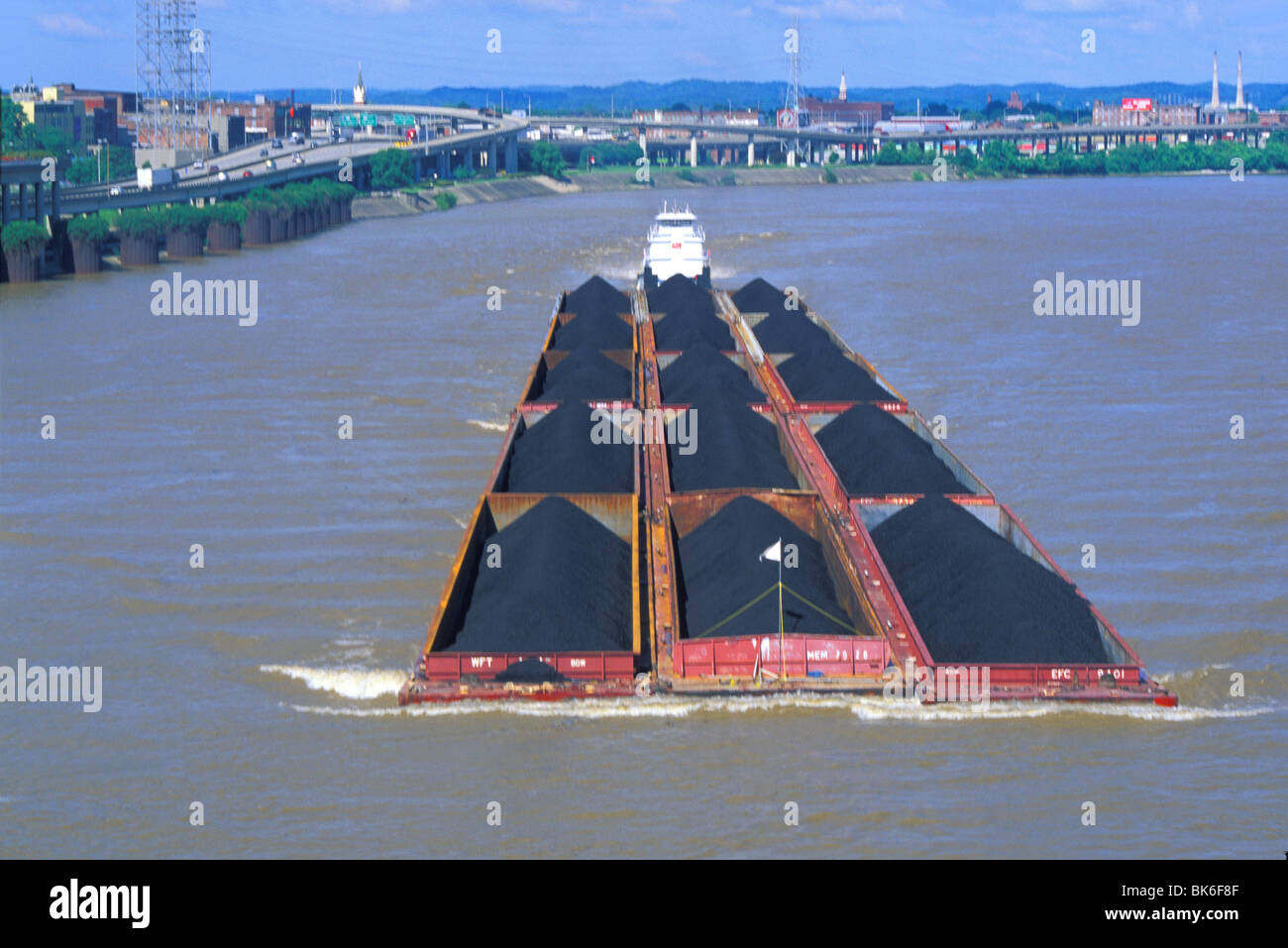 tugboat pushing coal barges up Ohio River Louisville Kentucky Stock Photo