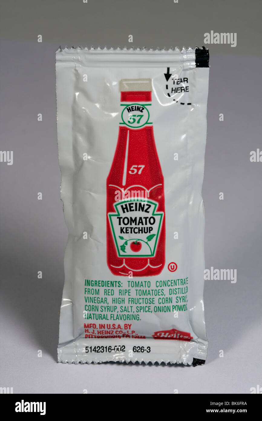 Single Serve Heinz Tomato Ketchup Packet. Stock Photo