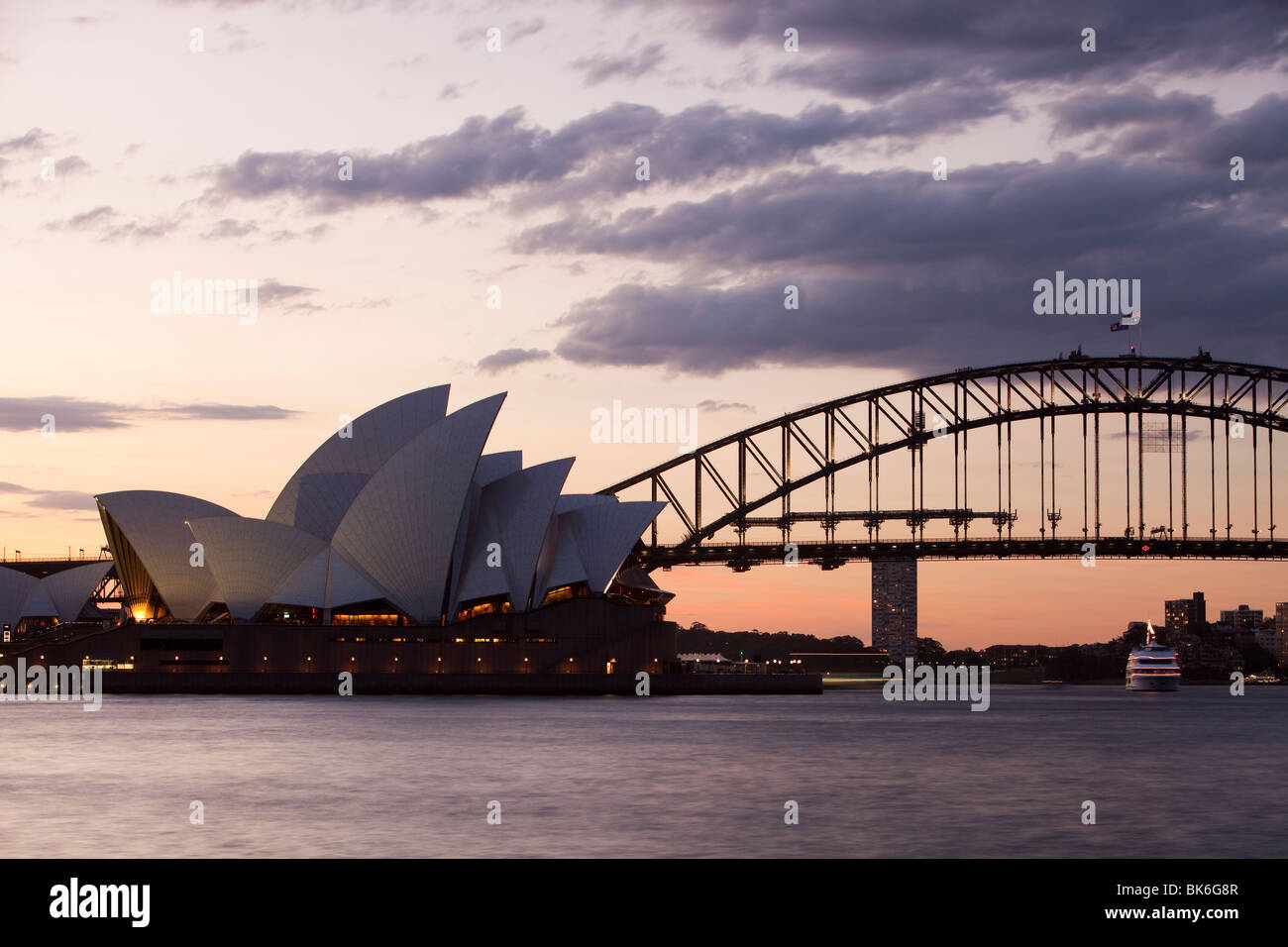 Sydney Opera House and Harbour Bridge at sunset, Australia Stock Photo ...