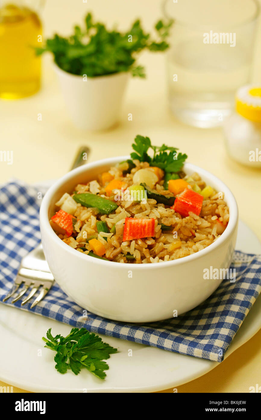 Wholemeal rice with surimi and vegetables. Step by step PEGCR4PEGCTP