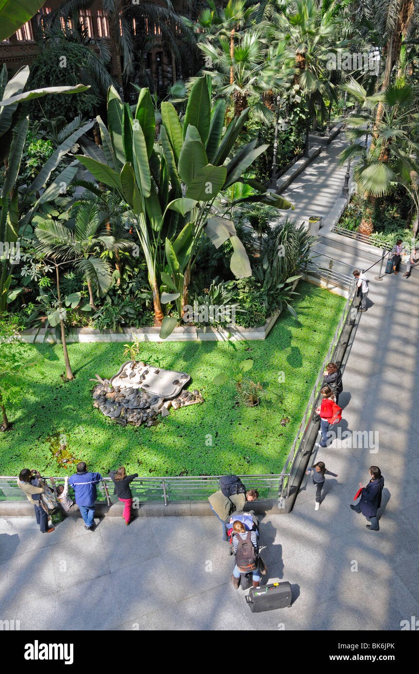Madrid, Spain. Atocha railway station. Tropical hothouse in old train shed Stock Photo