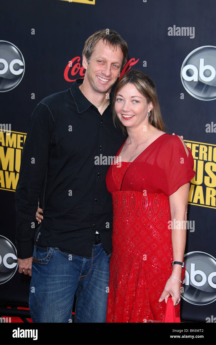 Tony Hawk And Wife Lhotse Merriam Stock Photos &amp; Tony Hawk