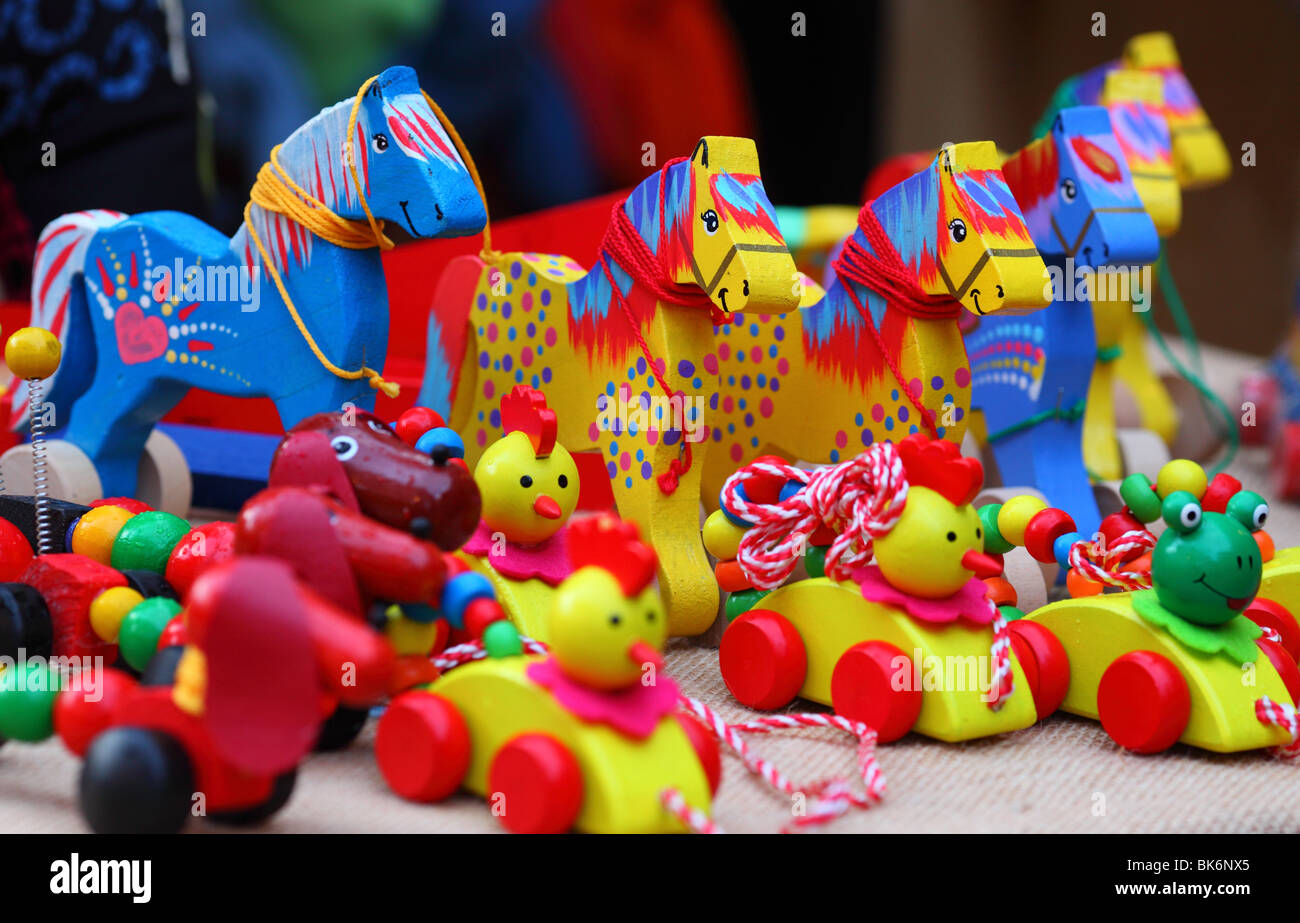 Colorful wooden horses and toys Stock Photo