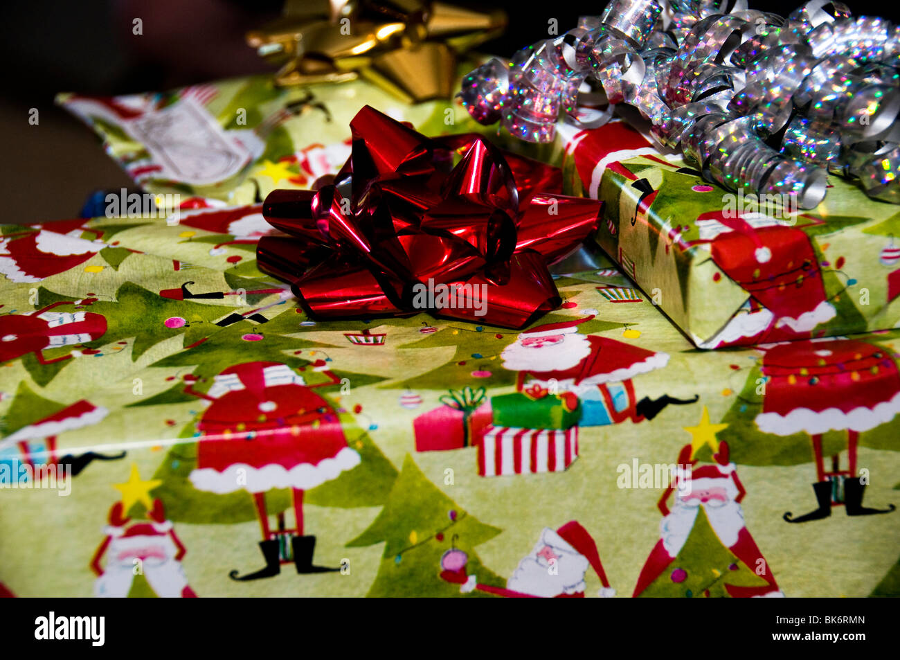 Christmas gifts, wrapped and with ribbons and bows. Closeup. Stock Photo