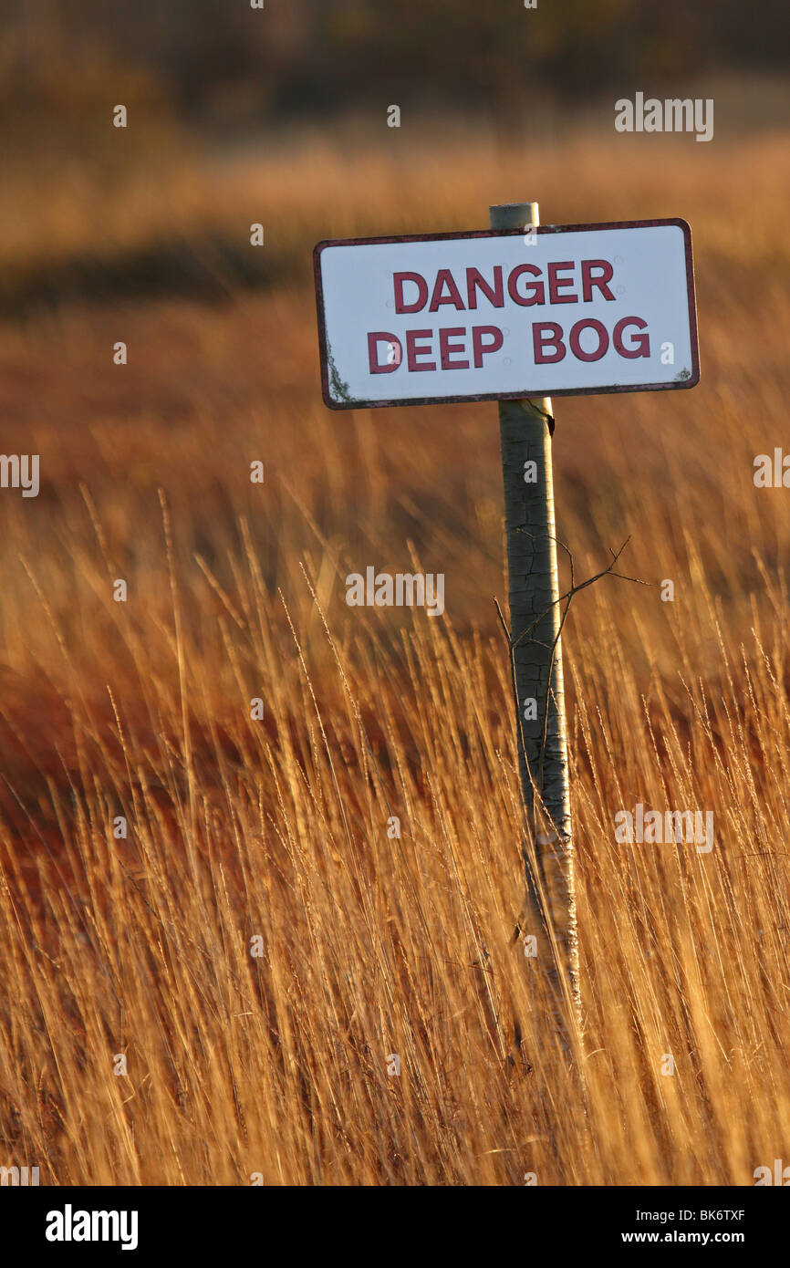 Sign to warn of dangerous bog area on Surrey Heathland Stock Photo Alamy