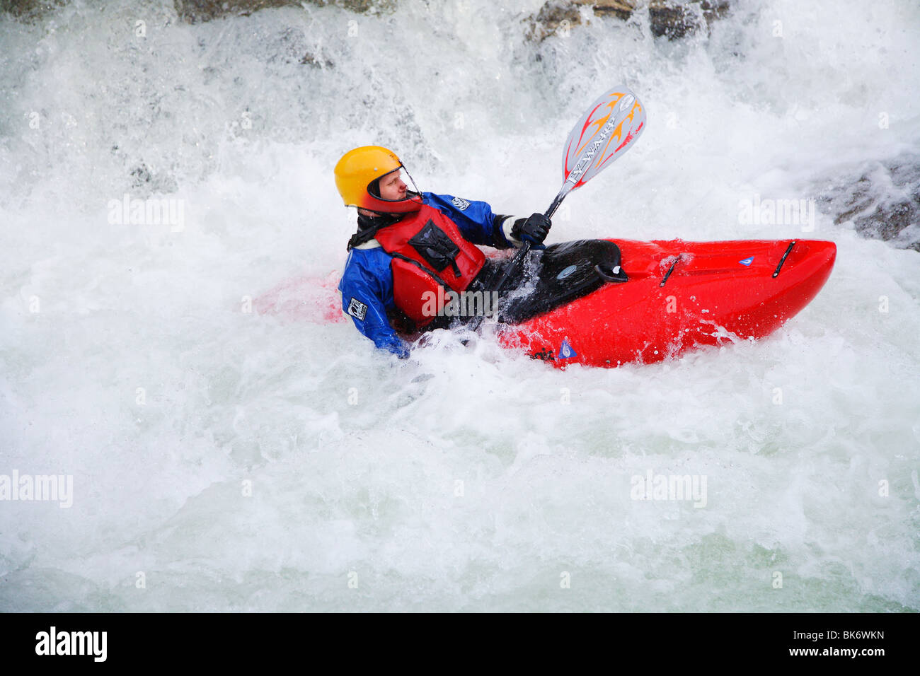 MALE KAYAKER CRASHING THROUGH RAPIDS BULL SLUICE CHATTOOGA RIVER