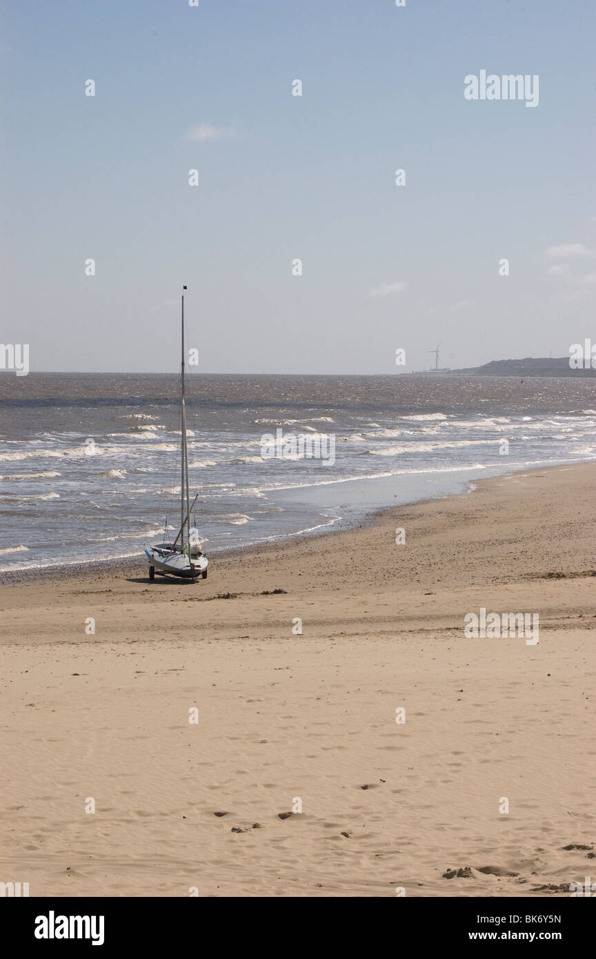 Small sailing boat on Gorleston beach Stock Photo