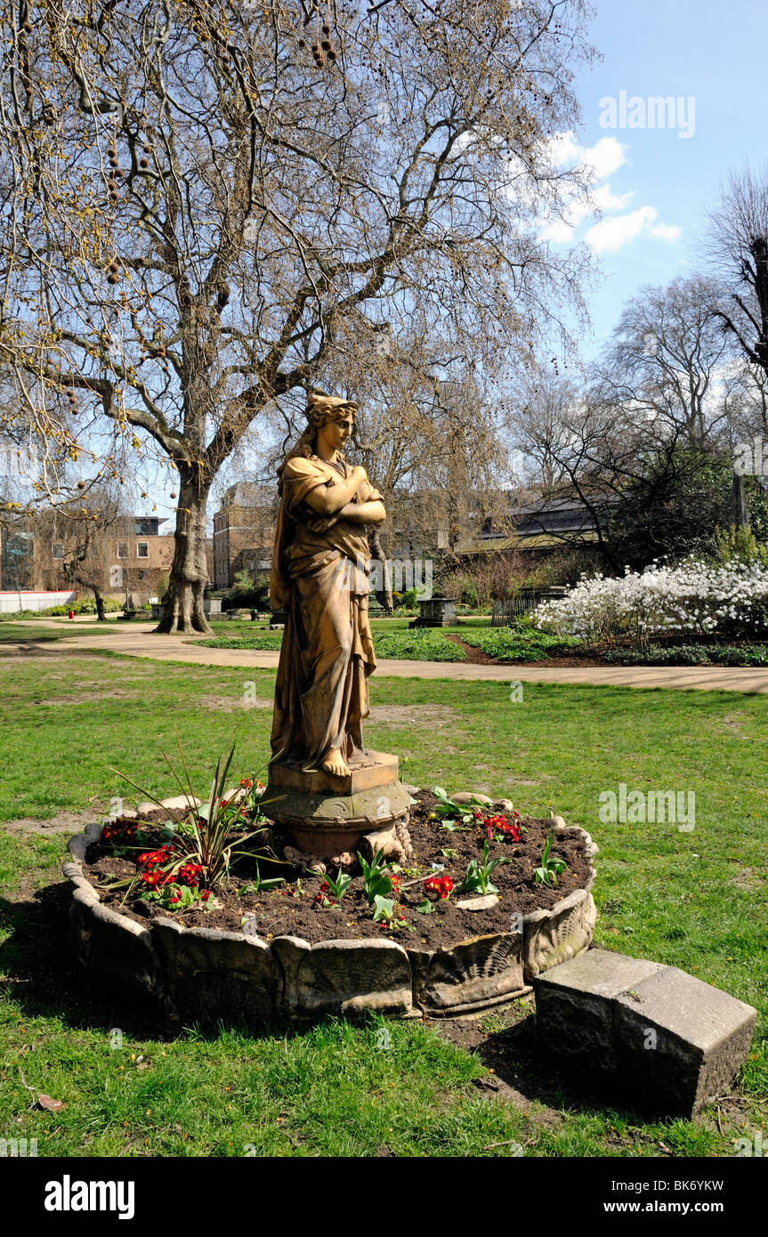 Statue of Euterpe the Muse of Instrumental Music, a Terracotta figure in St George's Gardens Bloomsbury London England UK Stock Photo