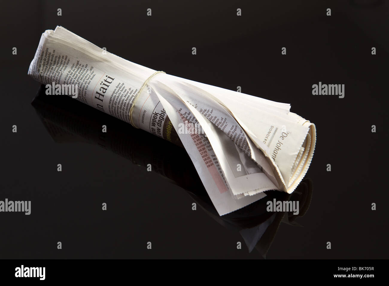 Rolled up newspaper hires stock photography and images Alamy