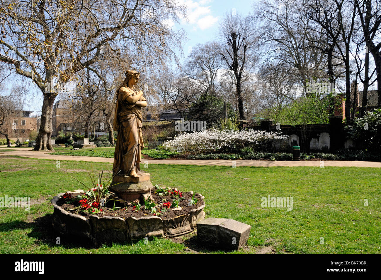 Statue of Euterpe the Muse of Instrumental Music, a Terracotta figure in St George's Gardens Bloomsbury Camden London England UK Stock Photo
