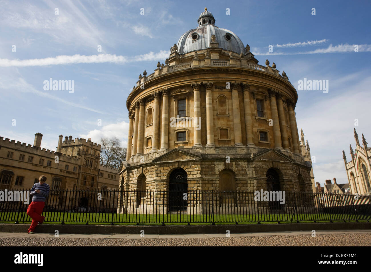 Oxford University Student and Radcliffe Camera 150 feet (46 meters) above cobbled Radcliffe Square. Stock Photo