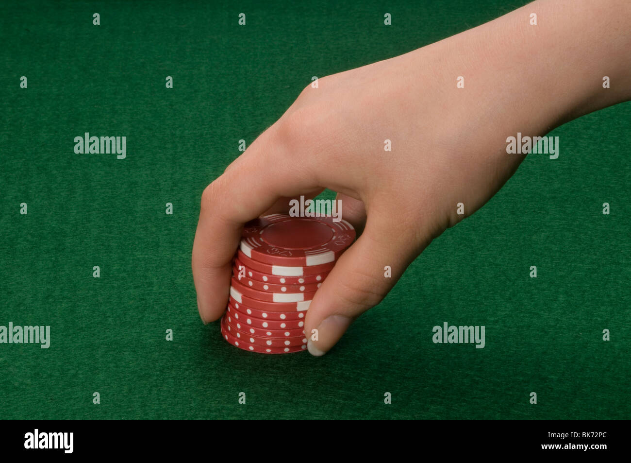 hand holding gambling device Stock Photo