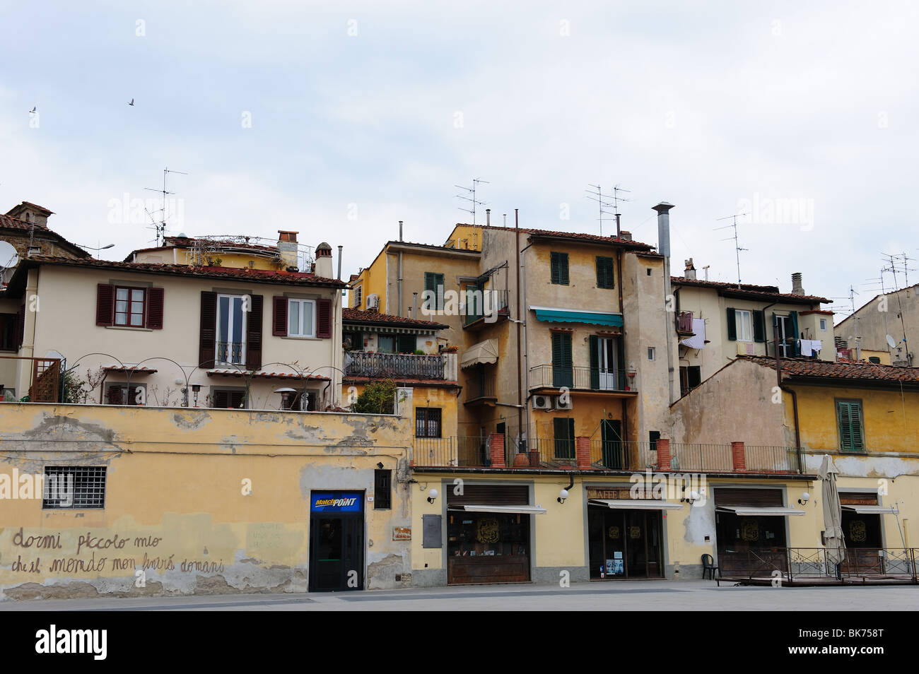 Apartment buildings and shops in Florence Italy Stock Photo Alamy