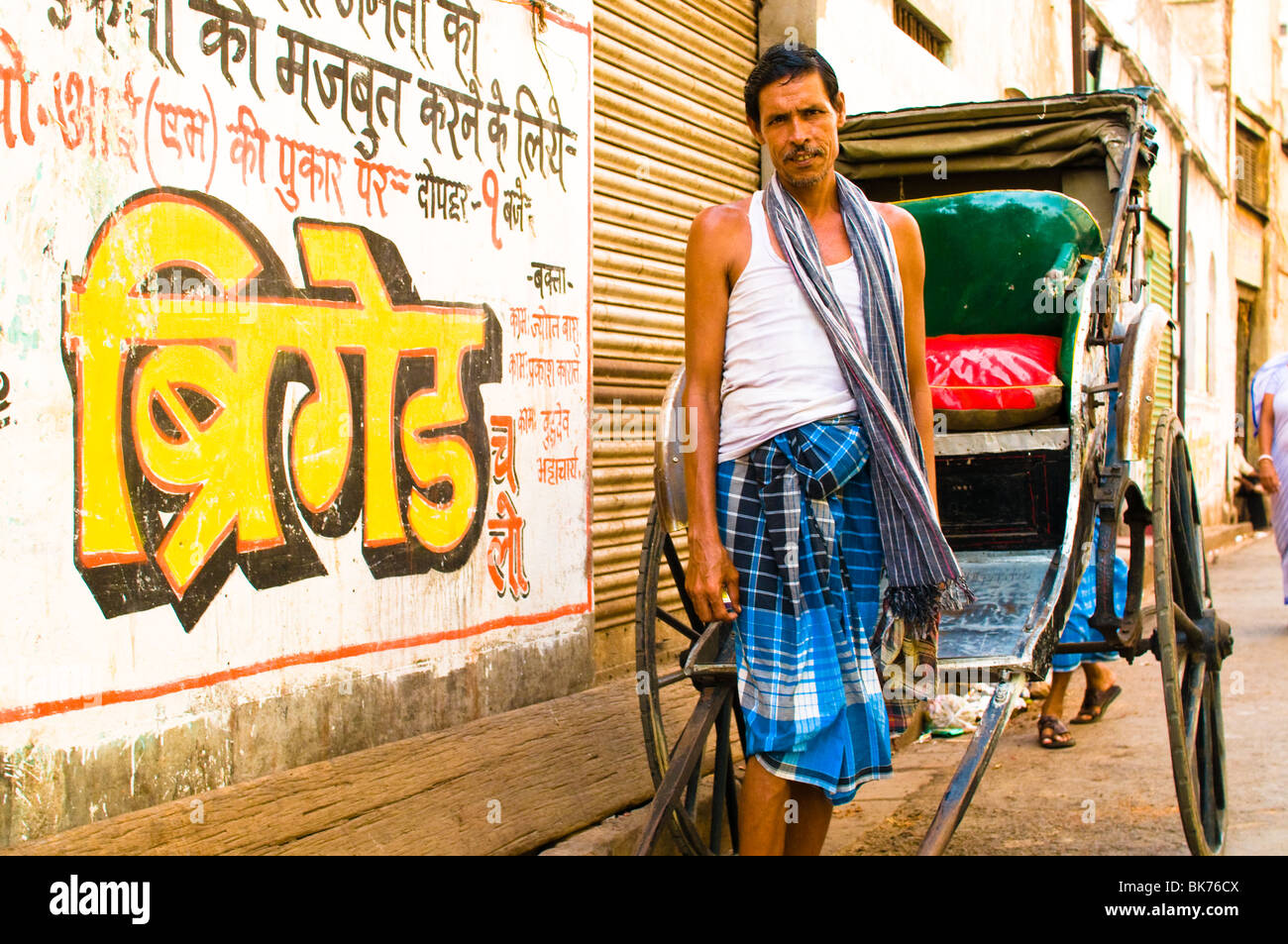 This is an image of a rickshaw runner in the streets of Calcutta, India ...