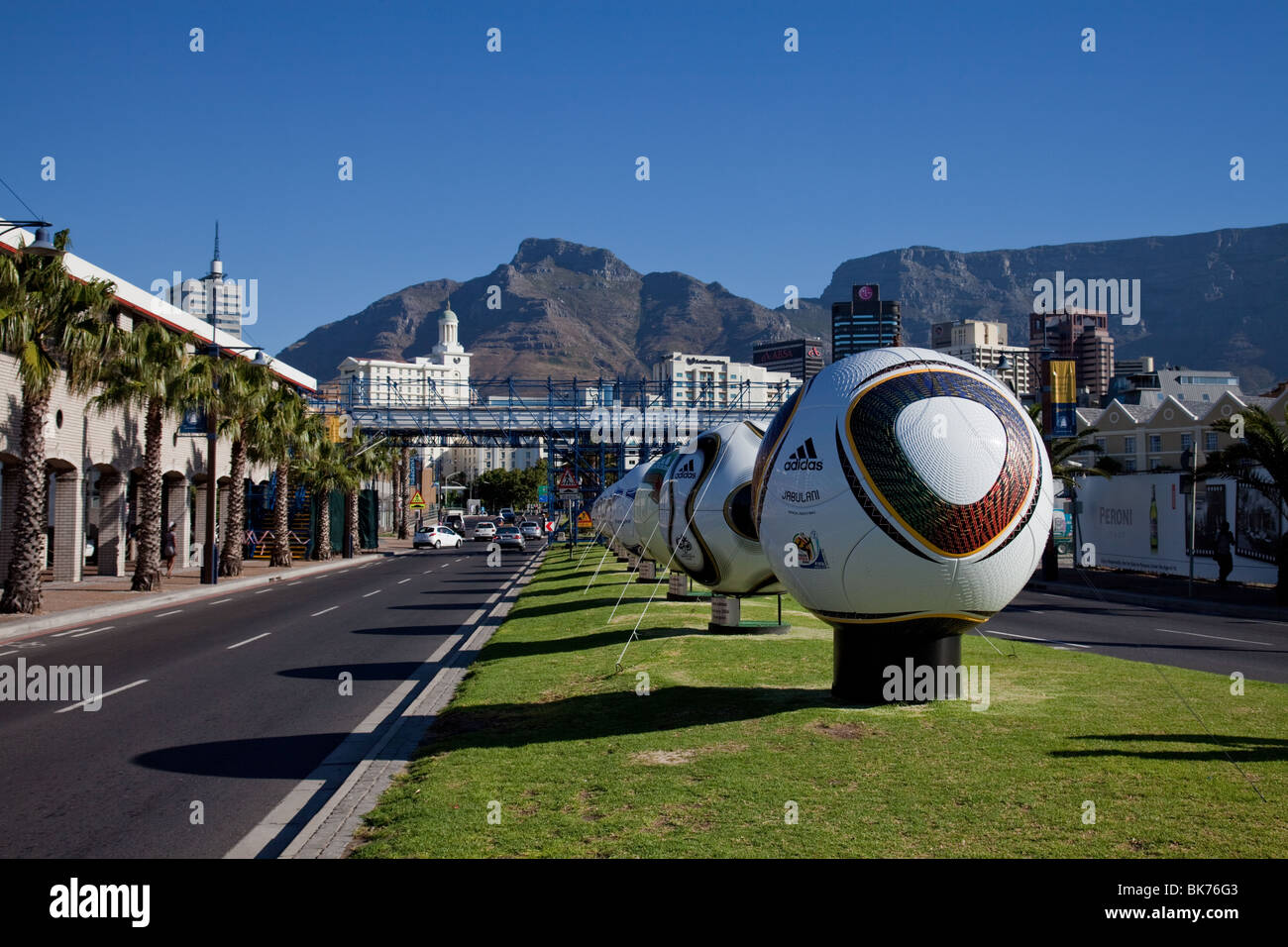 Giant footballs along a road in Cape Town, South Africa Stock Photo