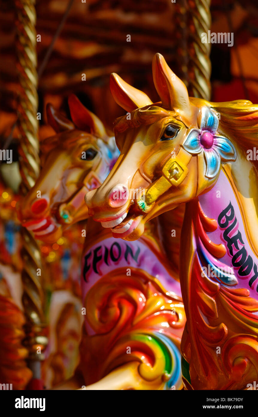 Clourful Carousel Horses ride in Cardiff Bay, Wales, UK Stock Photo