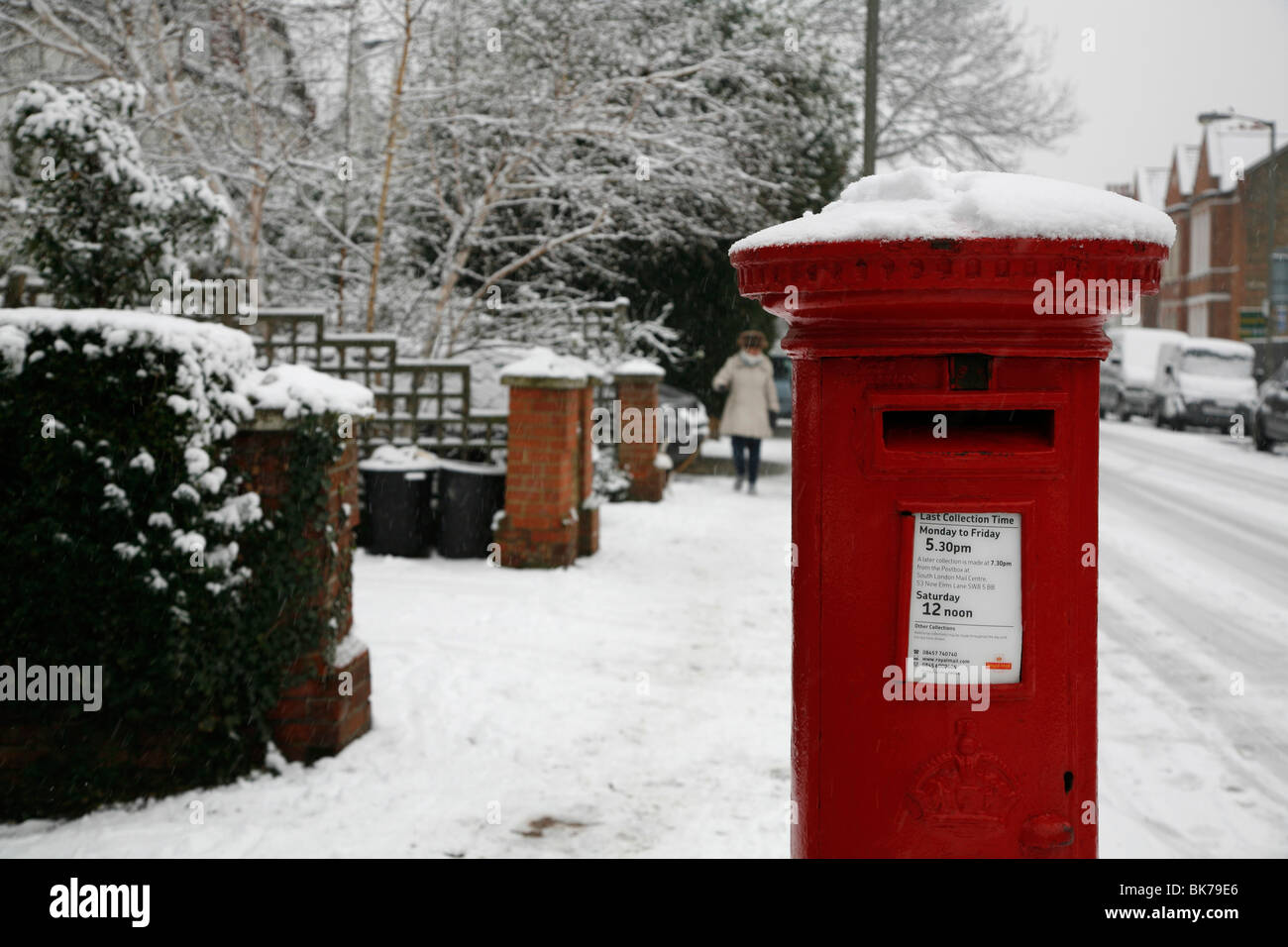Snow on a Royal Mail post box on Deodar Road, Putney, London, UK Stock Photo