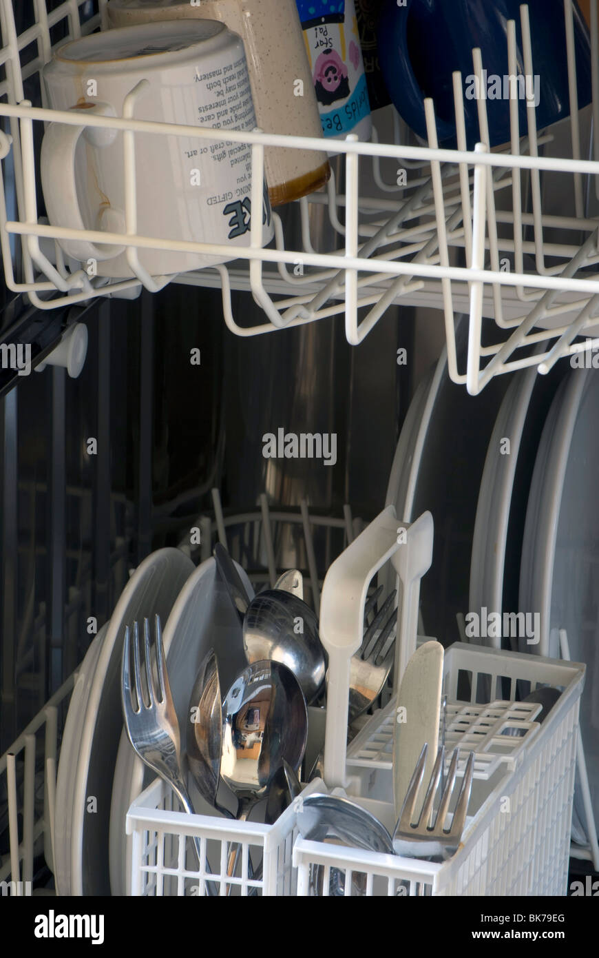 Dishes, mugs and cutlery in a dishwasher Stock Photo Alamy