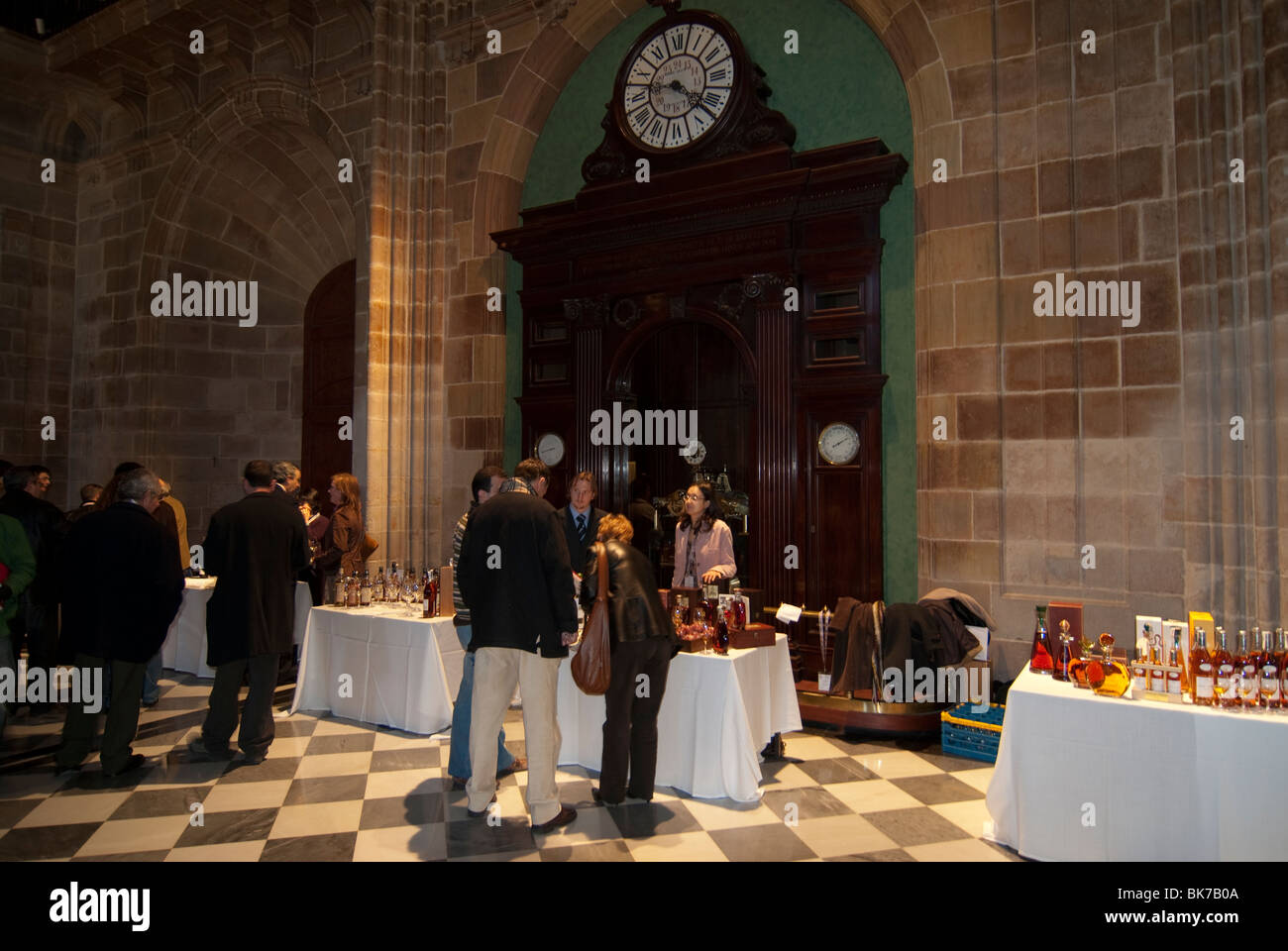 stands at a wine tasting event during a trade show in an old palace Stock Photo