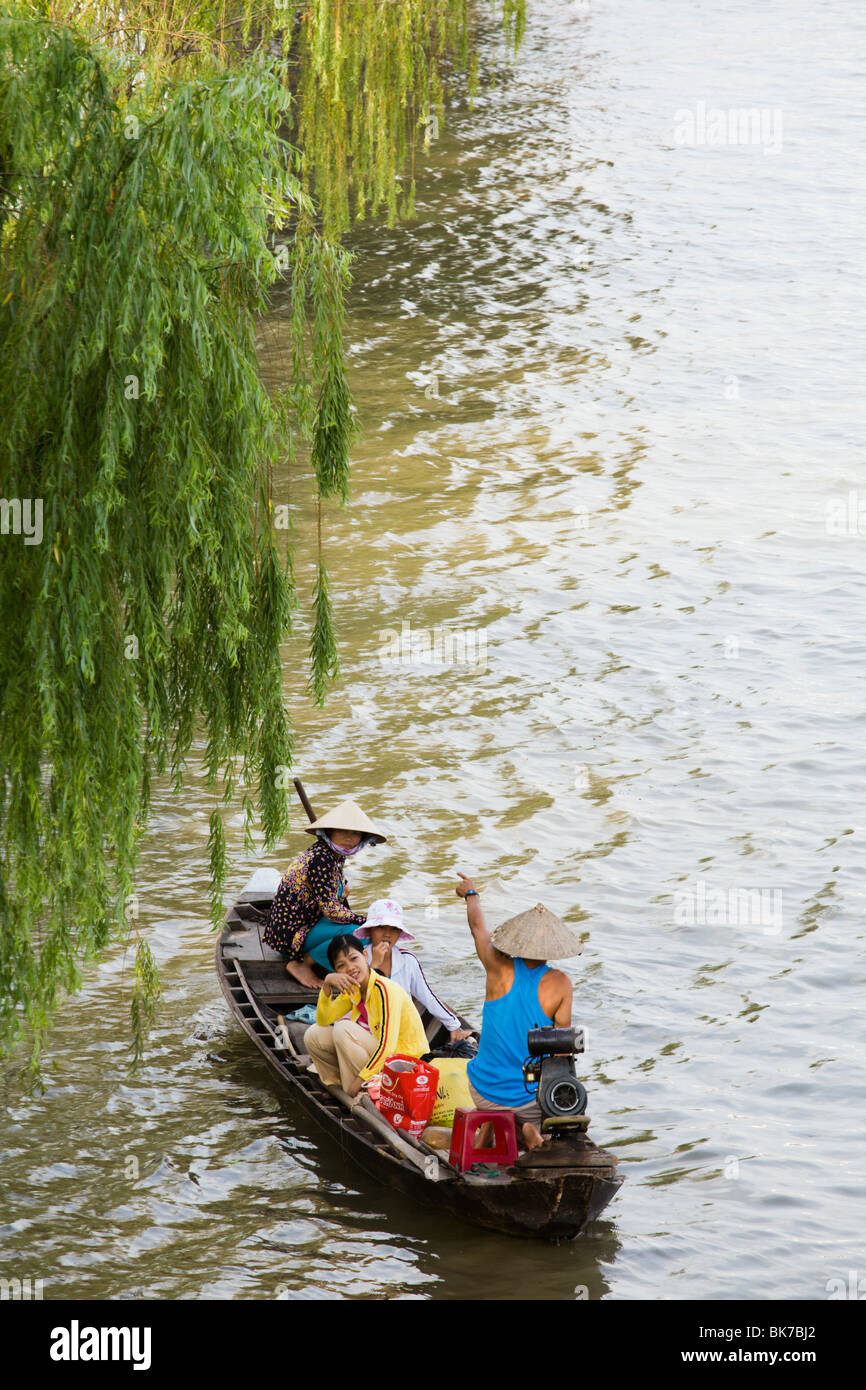 Family on a boat trip on Can Tho River in the Vietnam Mekong Delta ...