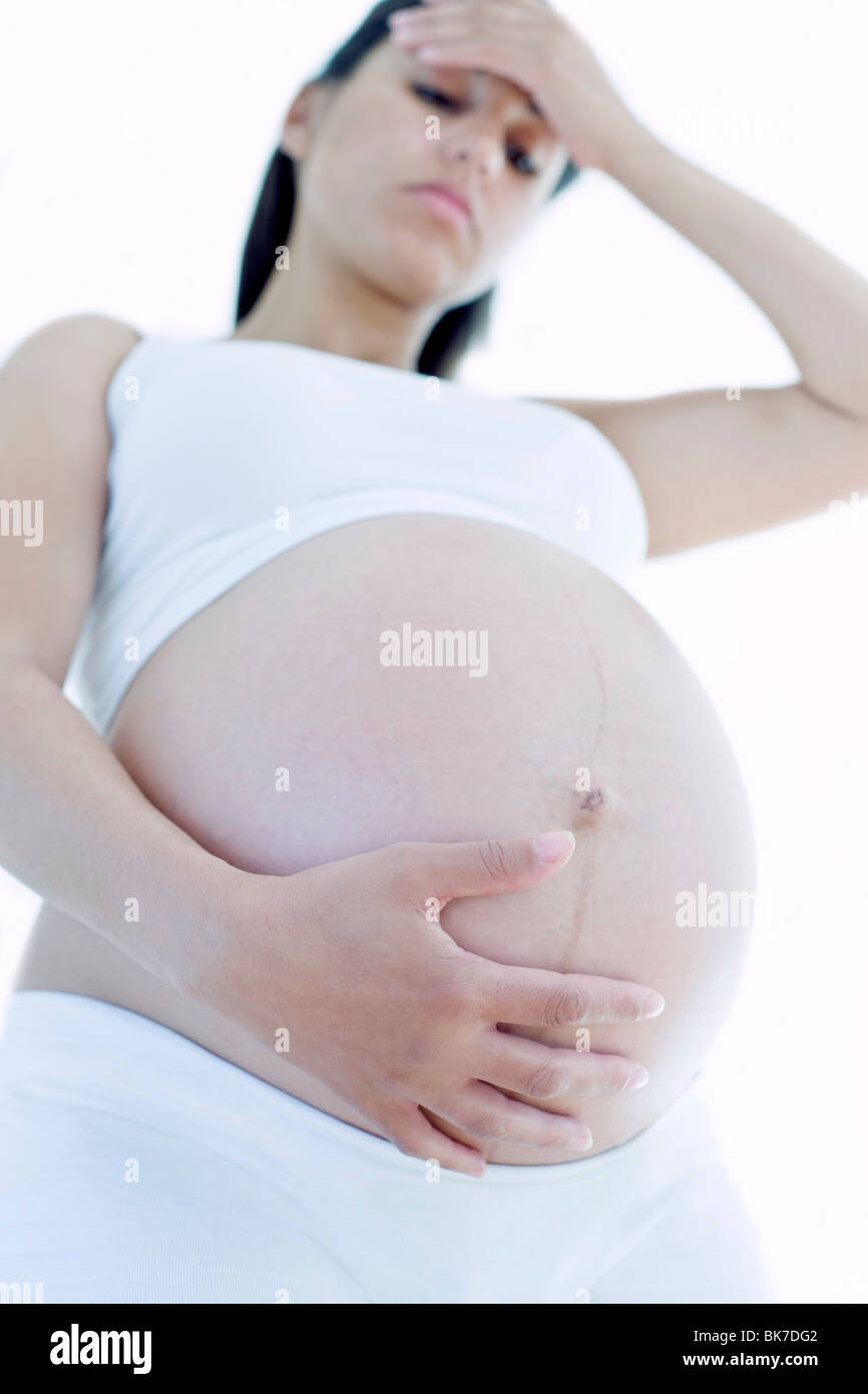 Depressed pregnant woman Stock Photo