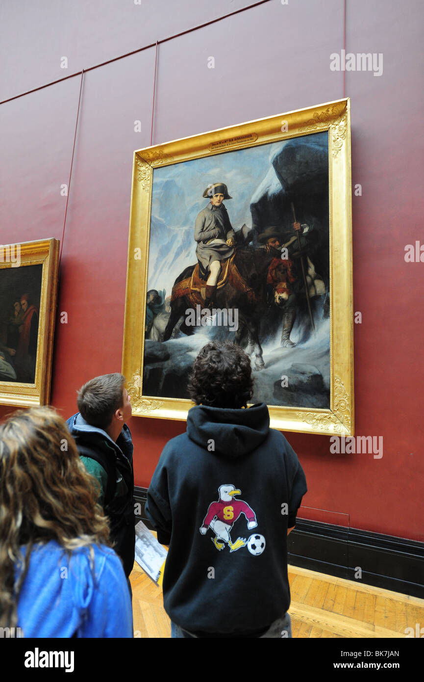 France Paris Louvre Museum Musee students teenagers view painting of Napoleon on horseback Stock Photo
