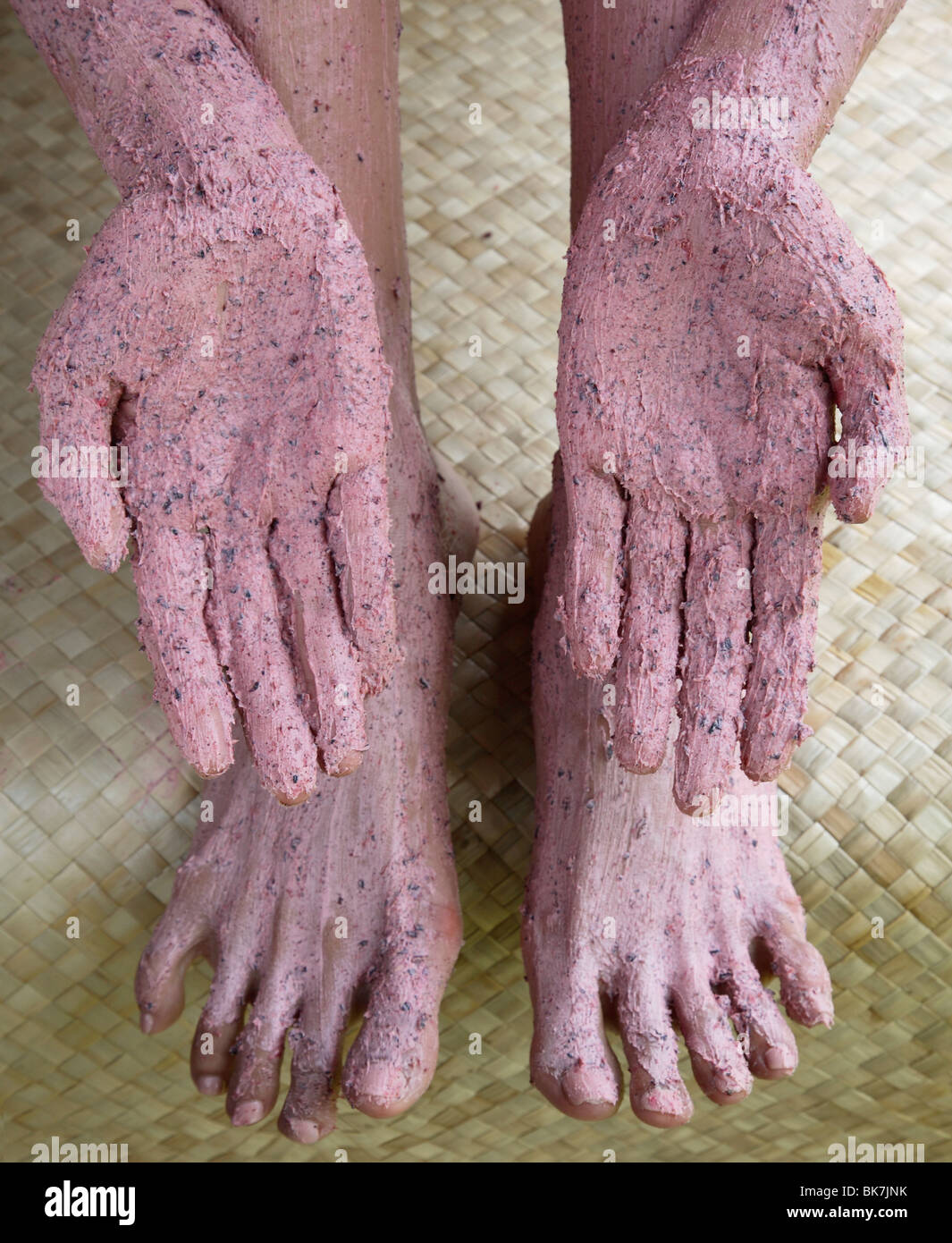 Closeup of Roselle body scrub treatment on hands and feet Stock Photo