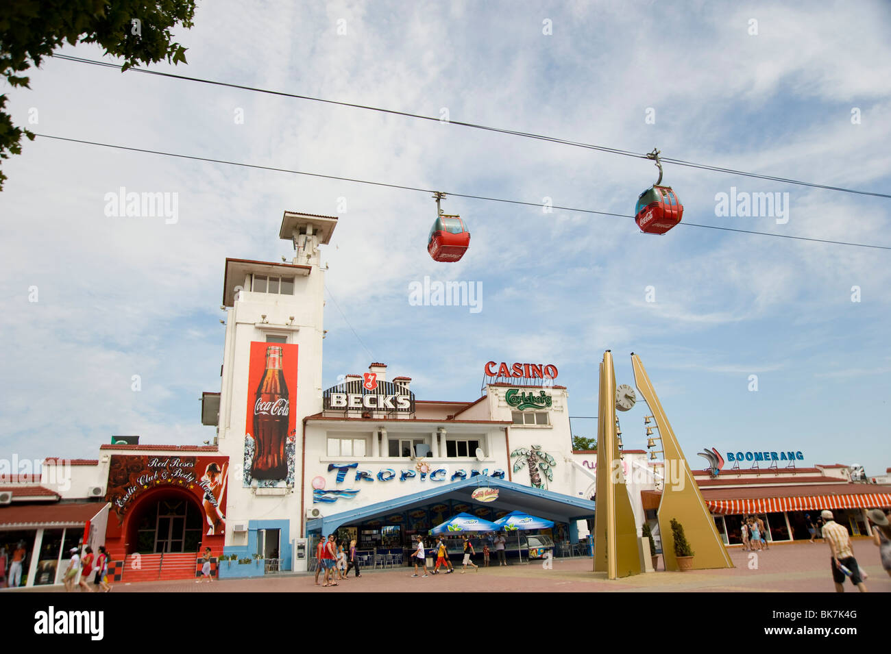 A cable car running above cafes in the Black Sea resort of Mamaia, Romania, Europe Stock Photo