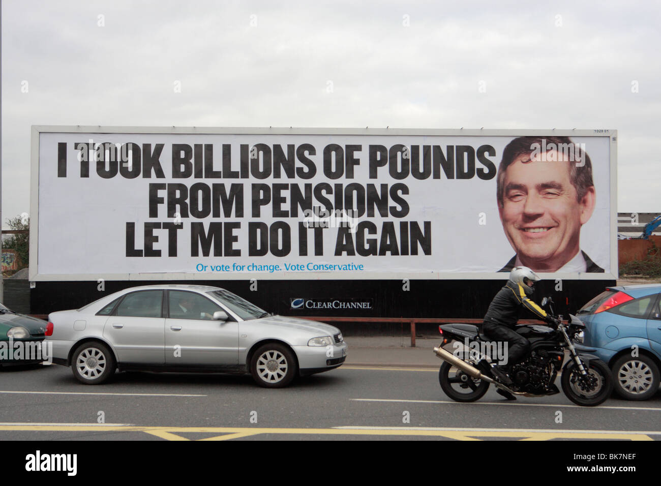 traffic driving past Tory poster featuring Gordon Brown 2010 Uk general election Stock Photo