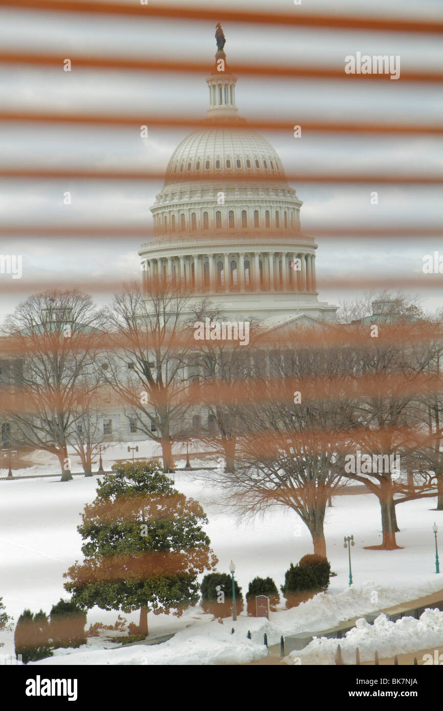 Washington DC,United States US Capitol,Capitol Hill Historic District,dome,government,Congress,symbol,democracy,view out window,Venetian blinds,winter Stock Photo