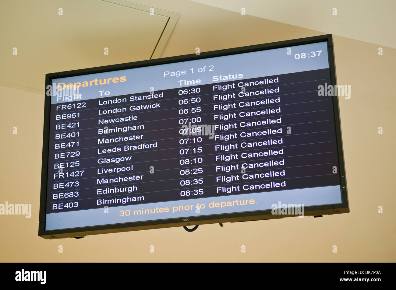 Departure board showing flights canceled Stock Photo