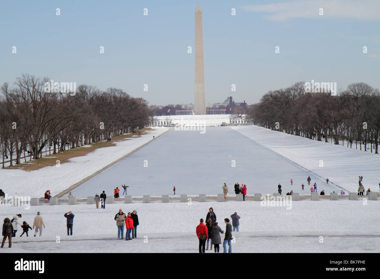 Washington DC,West Potomac Park,National Mall & Memorial Parks,The Reflecting Pool,Washington Monument,history,frozen,ice,snow,groups,DC100220013 Stock Photo