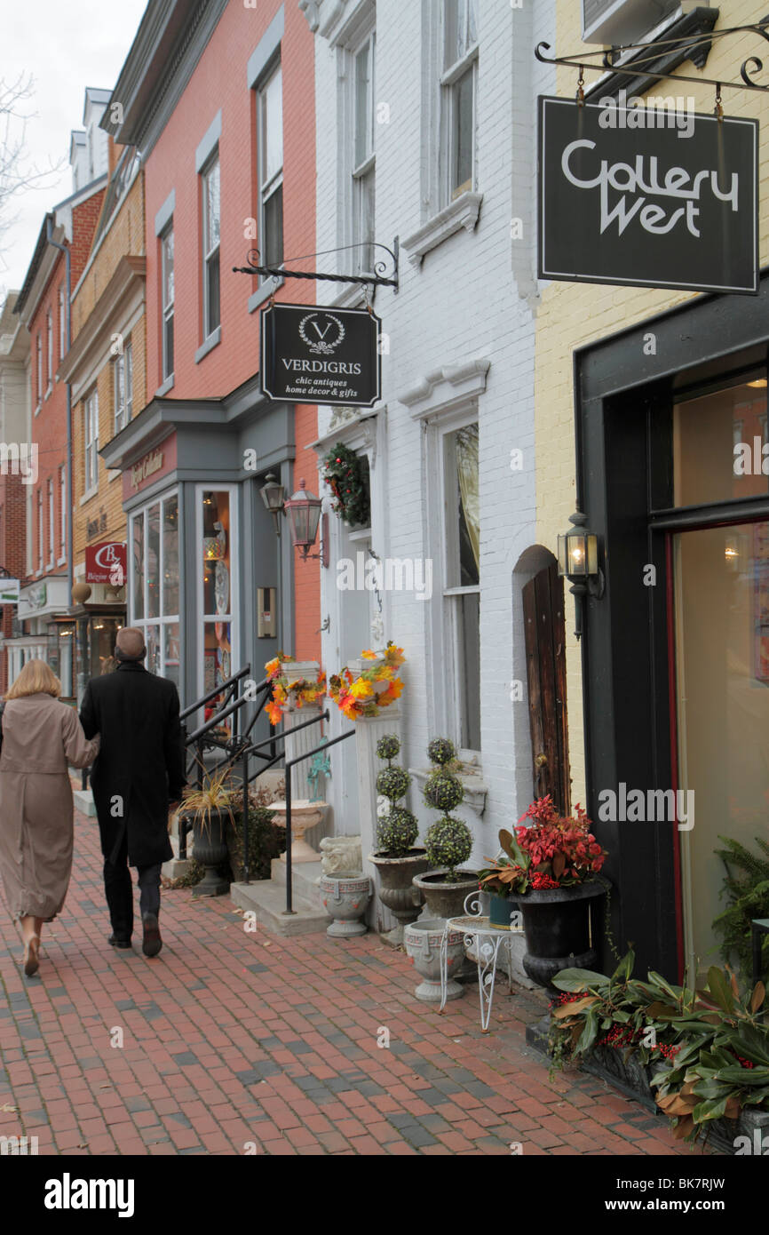 Alexandria Virginia,Old Town,King Street,historic district,street,sidewalk,store,stores,businesses,district,shop,boutique,man men male,woman female wo Stock Photo