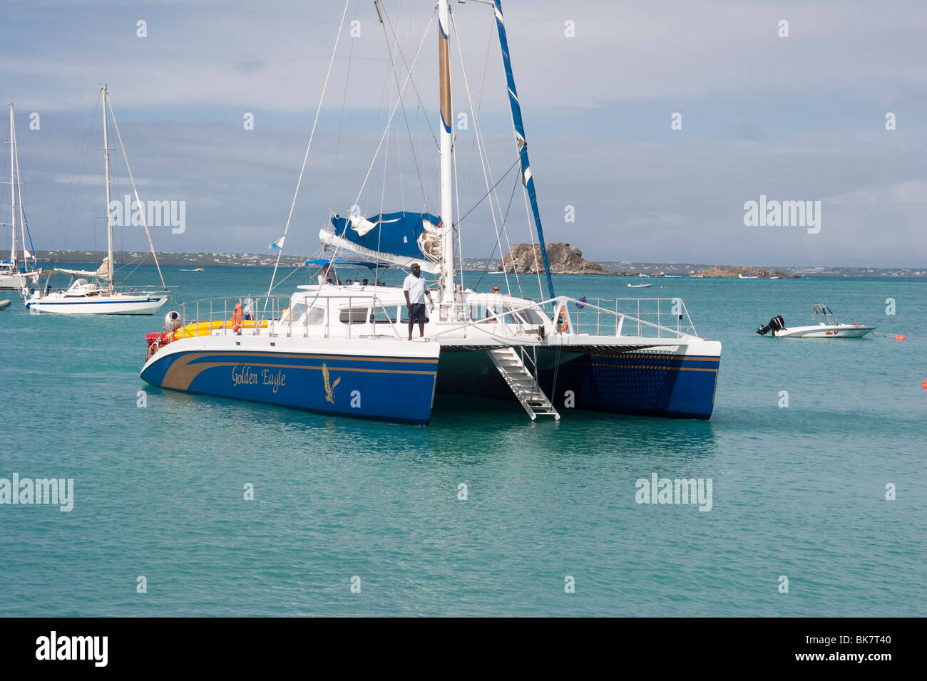 Catamaran GOLDEN EAGLE anchoring at Grand-Case, Saint Martin Stock Photo