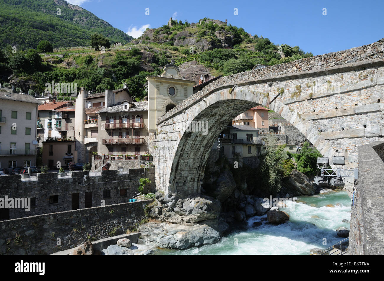 Roman bridge over torrente Lys Pont St Martin Aosta Valley Italy Stock Photo
