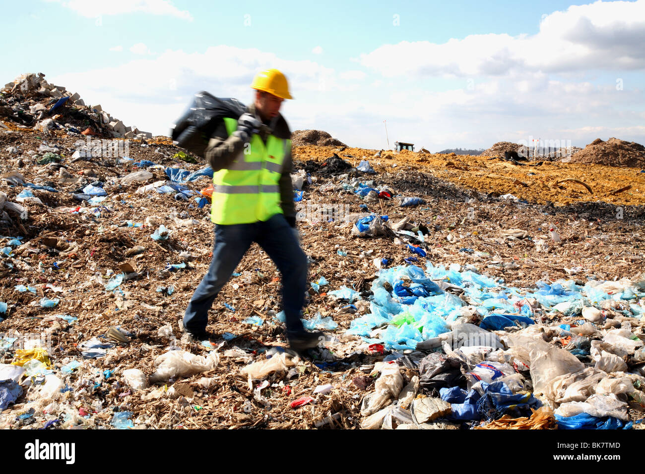 workman a landfill site Stock Photo